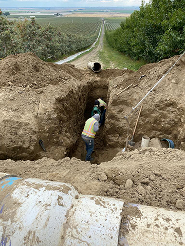 Photo obtained by L&I shows the irrigation pipe being repaired for Stemilt Ag Services before the trench collapse on Sept. 21, 2023.